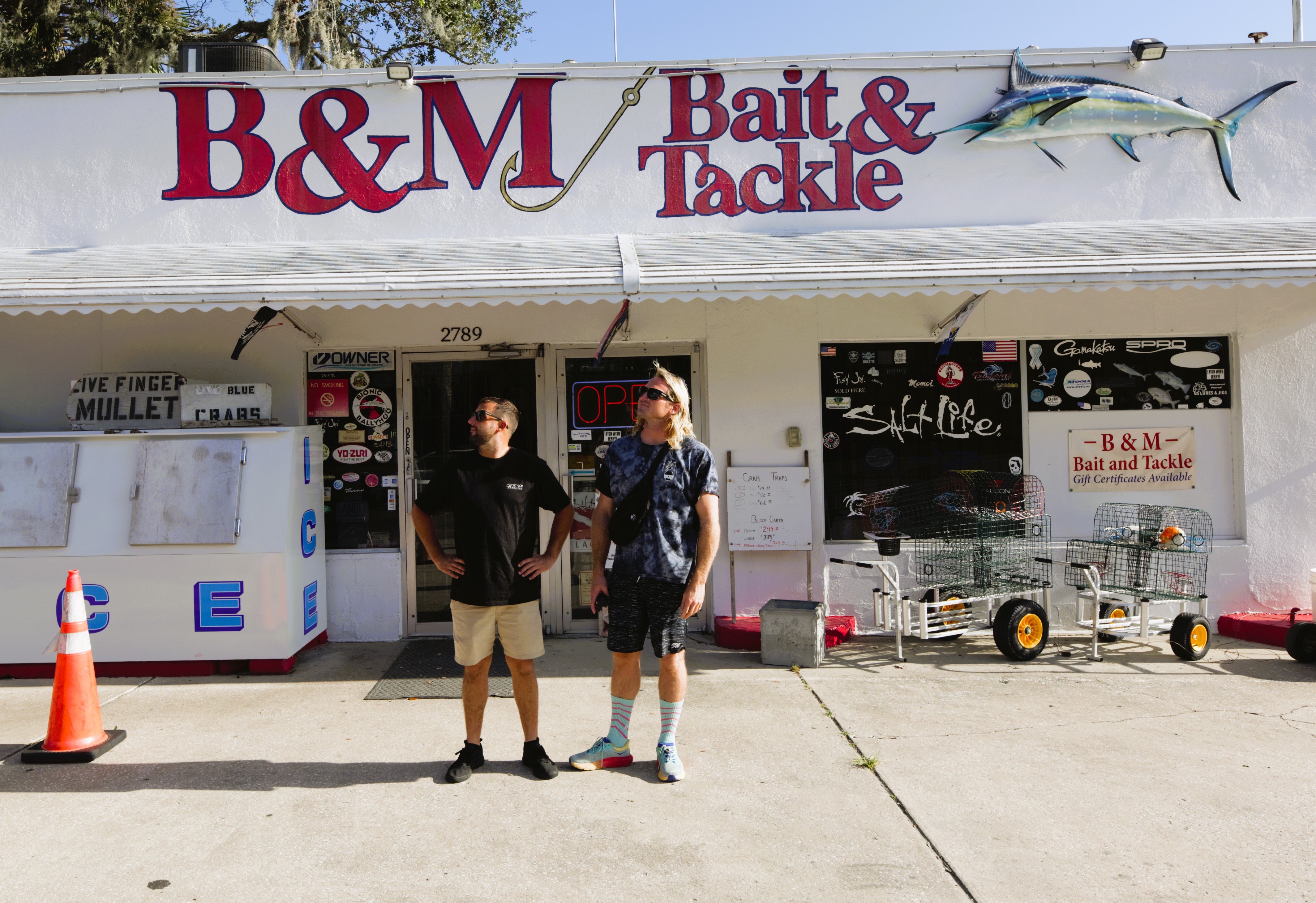 Ben Gravy and Justin Quintal in front of B&M Bait and Tackle.